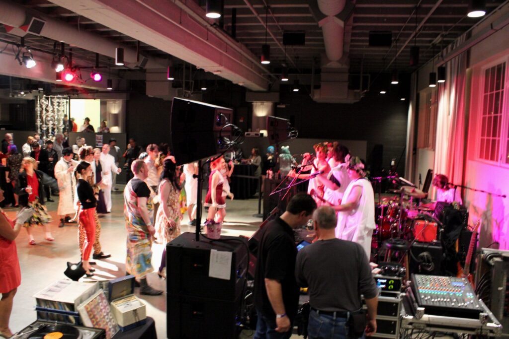 Side-stage mixing position during a costume gala