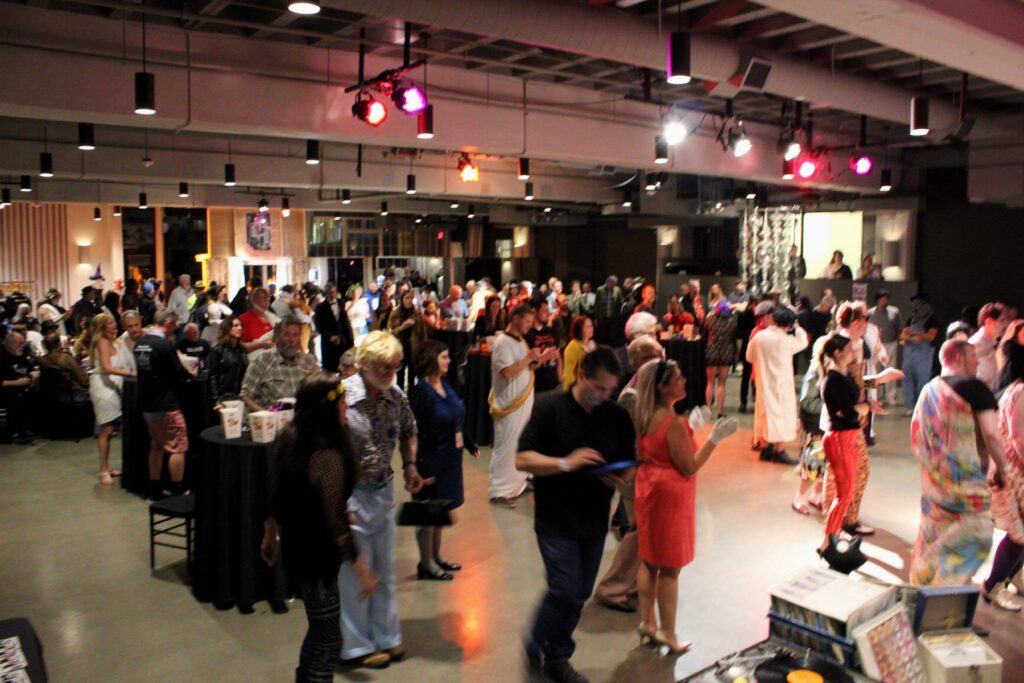 Packed dance floor at an evening gala